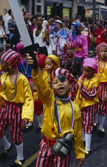 ENGLAND, London, Children in pirate costumes during parade.