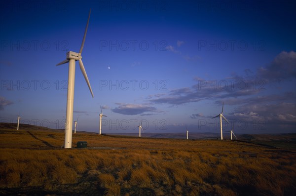 ENVIRONMENT, Energy, Wind Power, "Coal Clough Windfarm with tall wind turbines leading out across the landscape, near Todmorden, West Yorkshire"