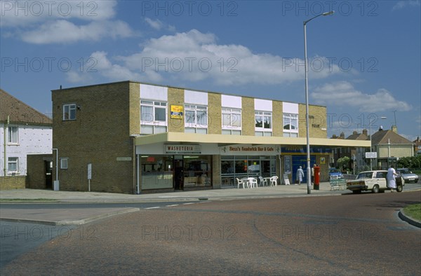 ENGLAND, East Sussex, Eastbourne, Row of local shops in Hampden Park area.