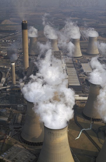 ENGLAND, North Yorkshire, Drax, Aerial view over cluster of Power Station chimneys releasing white smoke into the atmosphere.