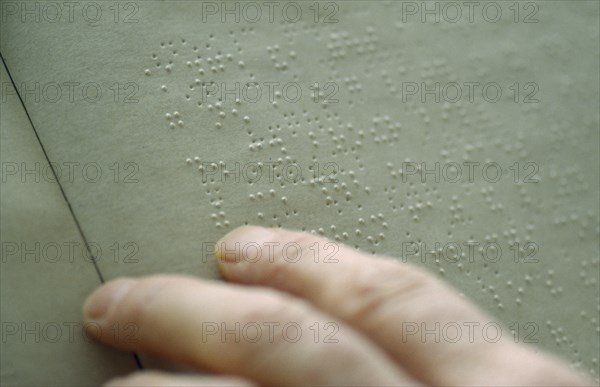 HANDICAP,  , Blind, Close up of hand reading braille