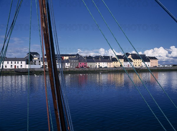 IRELAND, County Galway, Galway City, View across the River Corrib toward colourful houses near the Spanish Arch