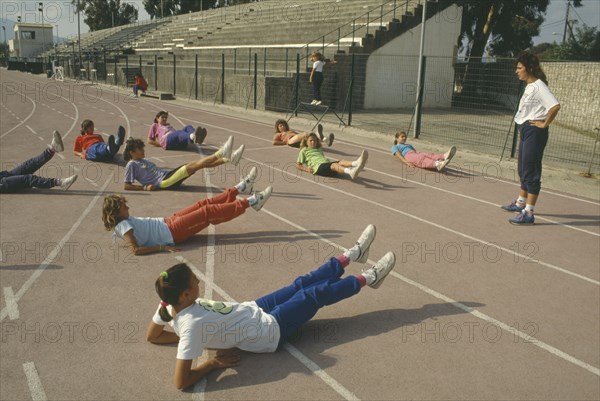 GREECE, Education, Exercise, Children exercising on School track