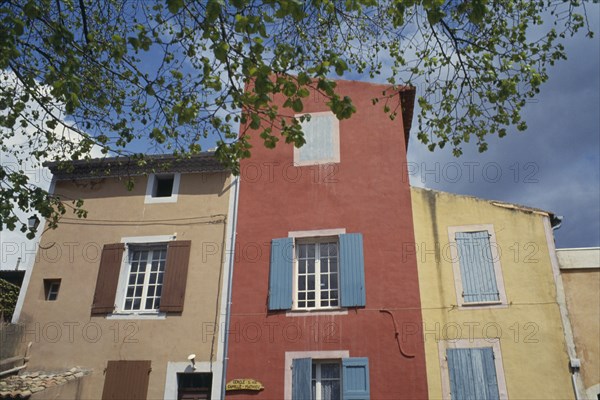 FRANCE, Languedoc Rousillon, Colourful building with shutters