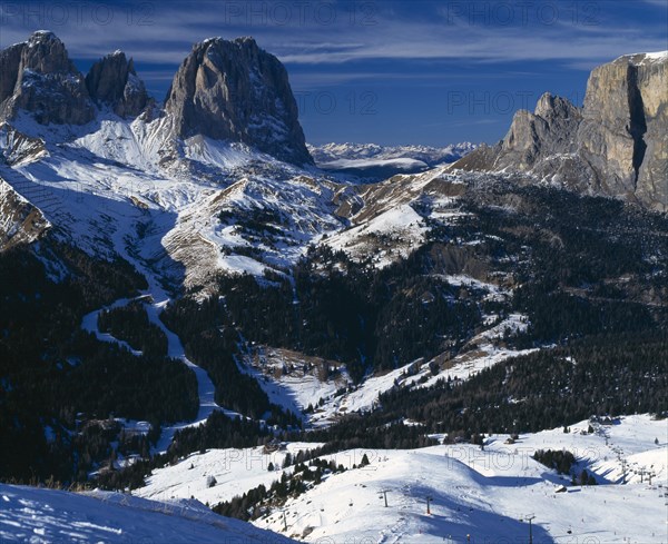 ITALY, Trentino Alto Adige, Dolomites, Val di Fassa. Belvedere. View down mountain side of ski resort