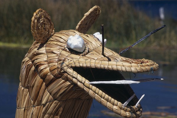 PERU, Puno Administrative Division, Lake Titicaca , "Detail of the prow of a reedboat, the lake beyond. "