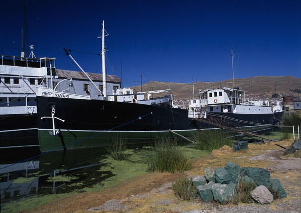 PERU, Puno Administrative Division, Puno, "Lake Titicaca.  Yavari, the oldest ship on Lake Titicaca moored at the bankside."