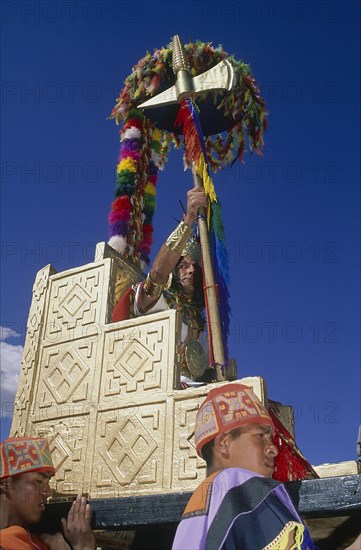 PERU, Cusco Department, Cusco, Emperor Pachacuti being carried in a golden throne at Inti Raymi.