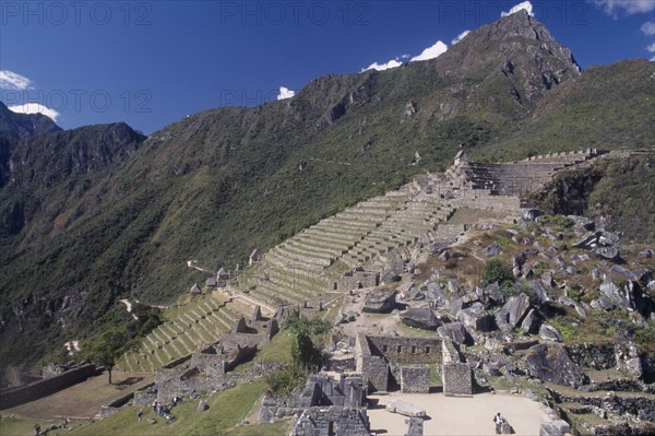 PERU, Cusco Department, Machu  Picchu, View across the ruins towards surrounding mountains.
