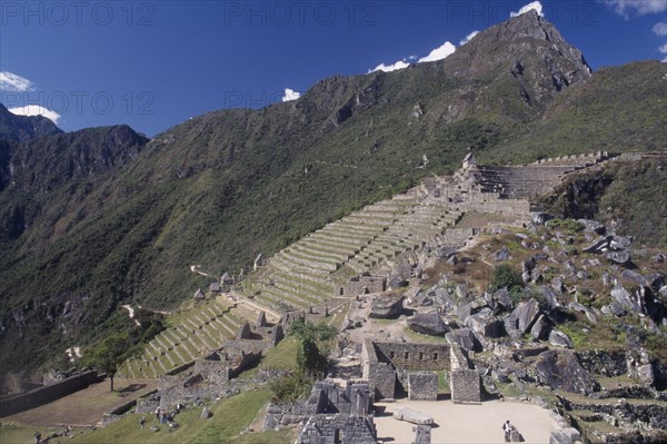 PERU, Cusco Department, Machu Picchu, View across the ruins towards surrounding mountains.