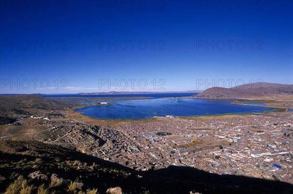 PERU, Puno Administrative Department, Puno, View over Puno twards Lake Titicaca in the distance.