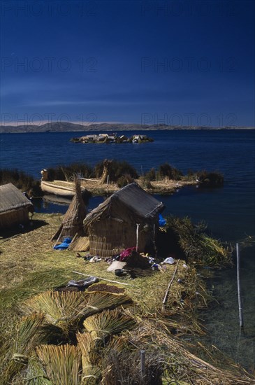 PERU, Puno, Lake Titicaca, Reed houses on floating islands built by the Uros people.