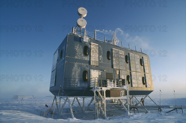 ANTARCTICA, South Pole, El dorm.  Elevated dormitory used as housing for summer and winter personnel raised on stilts above the snow at the US Amundsen-Scott South Pole Station.