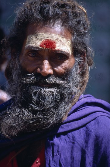 INDIA, Tamil Nadu , Madurai, "Male devotee at the Sri Meenakshi Temple, portrait."