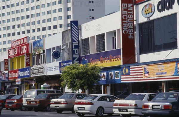 MALAYSIA, Kedah, Langkawi, Kuah old town electrical goods shops with cars parked in front