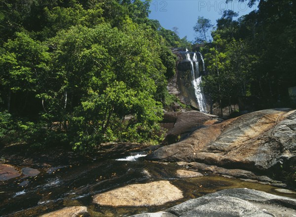 MALAYSIA, Kedah, Langkawi, Telaga Tujuh Seven Wells Waterfall with the stream in the foreground