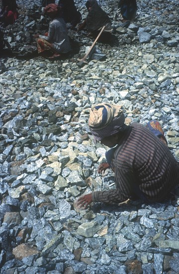 MYANMAR, Taukkyan, Road construction workers at Taukkyan near Yangon.