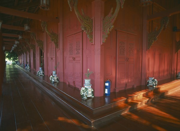 MALAYSIA, Kedah, Langkawi, The Summer Palace on Pantai Kok beach showing the red walls and passages of the main pavilion