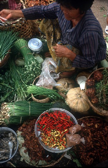 CAMBODIA, Phnom Pehn, Looking down on a stall at the vegetable market.