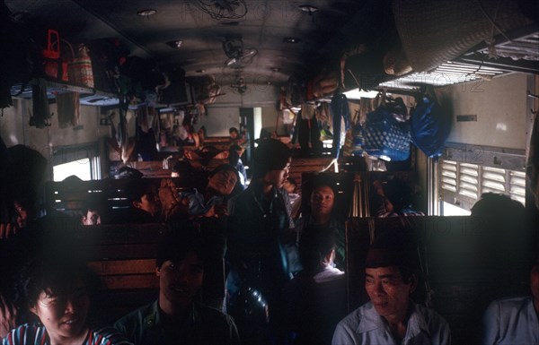 VIETNAM, Transport, The crowded interior of a third class train compartment travelling from Nhetang to Ho Chi Minh City.
