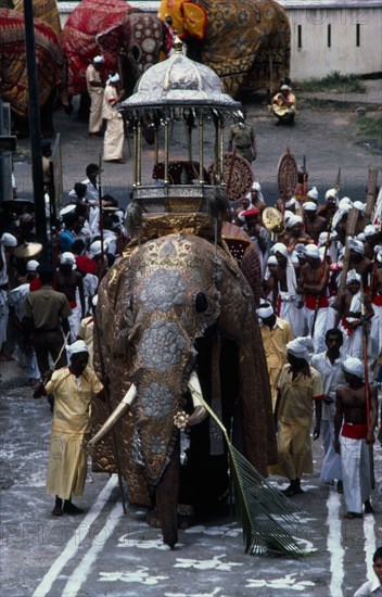 SRI LANKA, Kandy, "The Esala Perahera honouring the sacred Buddhist tooth relic of Kandy.  The Maligawa Tusker elephant carries a replica of the golden, relic casket."