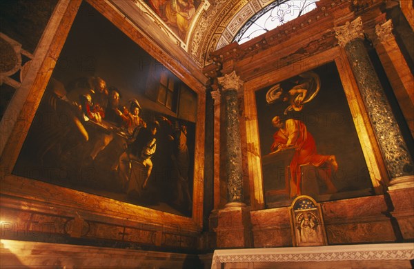 ITALY, Lazio, Rome, "San Luigi dei Francesi, The french National Church built in the 16th century.  Interior view of Caravaggio’s paintings: The Calling of St Matthew and St Matthew and the Angel painted between 1597 and 1602. "