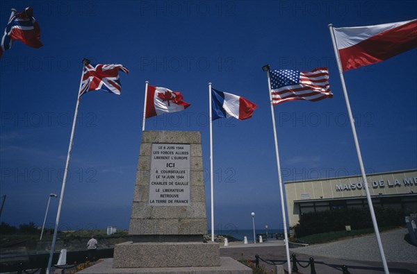 FRANCE, Normandy, Calvados, Courseulles Sur Mer.  Stone plinth commemorating the arrival of Charles de Gaulle and the allied forces at Courseulles in June 1944.