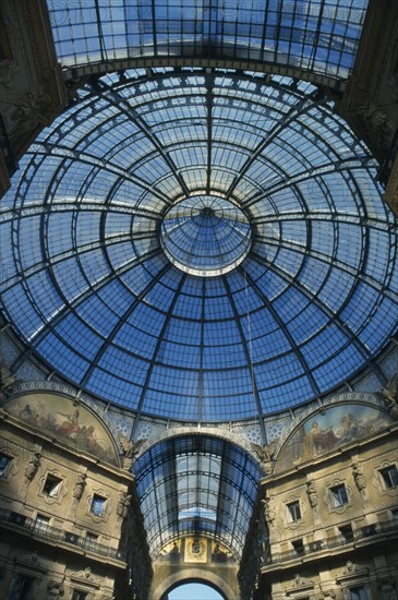 ITALY, Lombardy, Milan, Galleria Vittorio Emanuele II shopping arcade designed by the architect Giuseppe Mengoni in 1865.  Detail of glass ceiling and dome.