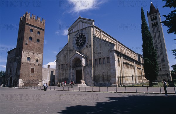 ITALY, Veneto, Verona, "Basilica di San Zeno Maggiore, exterior between bell tower on the right and another, crenellated tower on the left "
