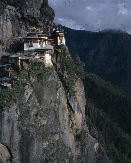 BHUTAN, Paro Valley, Taktshang Monastery, View of monastery situated high on cliff face.