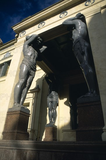 RUSSIA, St. Petersburg, Hermitage Museum.  Angled view of old entrance with granite Atlantes.