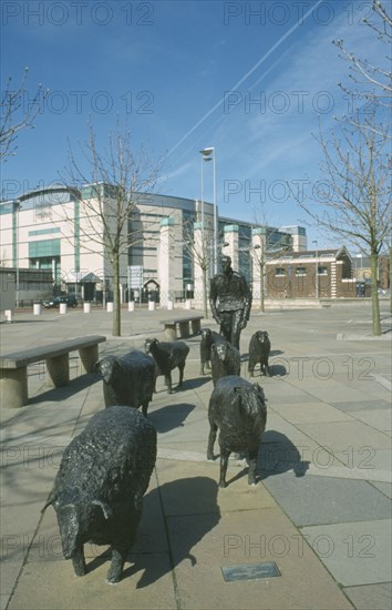 IRELAND, North, Belfast, "Shepherd and Sheep sculpture by artist Deborah Brown, in the grounds of the Waterfront Hall Lanyon Place"