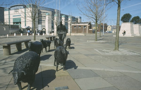 IRELAND, North, Belfast, "Shepherd and Sheep sculpture by artist Deborah Brown, in the grounds of the Waterfront Hall Lanyon Place"