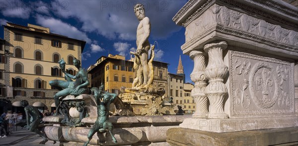 ITALY, Tuscany, Florence, "Piazza della Signoria.  Fontana di Nettuno, fountain designed in 1575 by Ammannati depicting Neptune surrounded by water nymphs."