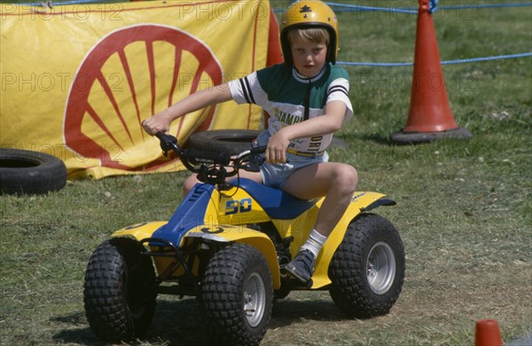 20020463 SPORT Motorbikes Children Young boy on quad bike