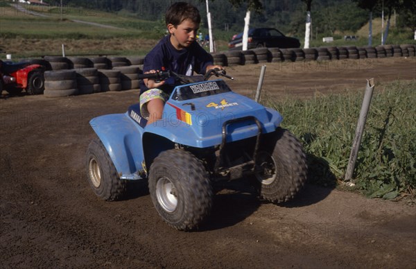 20020464 SPORT Motorbikes Children Young Basque boy near Guernica on a quad bike