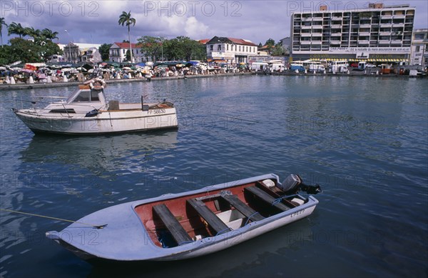 WEST INDIES, French Antilies, Guadeloupe, "Grande Terre, Pointe-a-Pitre.  Moored boats with busy quay and town buildings behind."