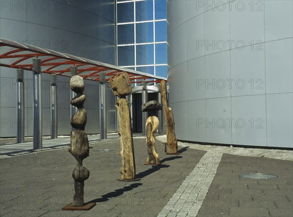 ICELAND, Reykjavik, "The Pearl. Entrance to the thermal heating storage and revolving retaurant complex, with wooden exhibition pieces lining the walkway."