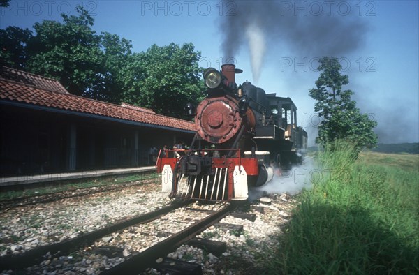 CUBA, Havana, Steam train moving along the track in Lenin Park