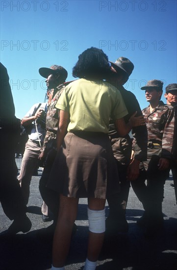 CUBA, Military, Soldiers returning from Angola being greeted by students