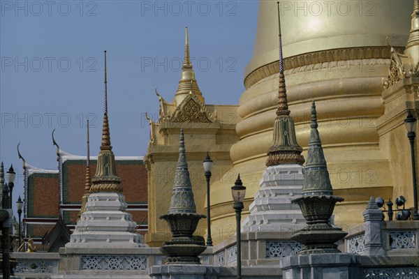 THAILAND, Bangkok, Grand Palace, Aka Wat Phra Kaeo. Exterior view of golden architecture and spires
