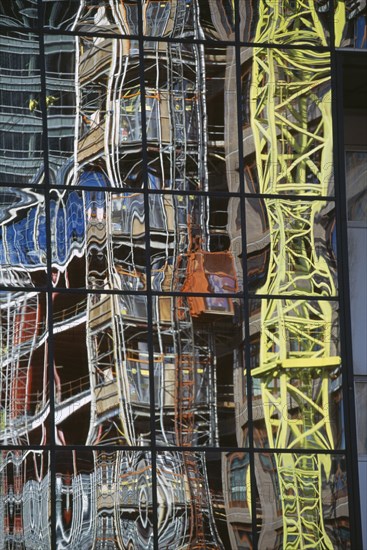 ARCHITECTURE, Detail, Mirror panels of building reflecting scaffold tower and surrounding architecture