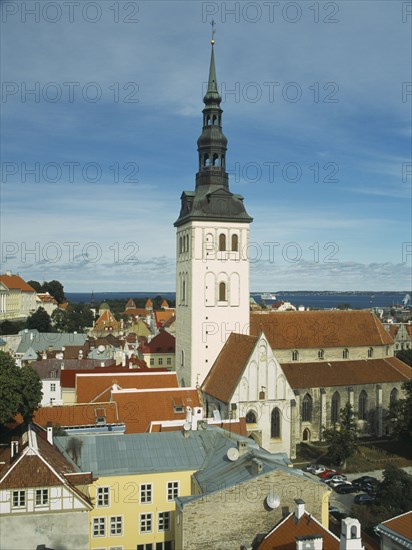 ESTONIA, Tallinn, View over fooftops towards the spire of Niguliste kirik or Saint Nicholas Church from Kiek in de Kok Tower.
