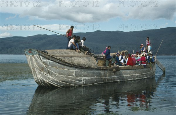 CHINA, Yunnan, Dali, Old junk carrying people on lake Er also known as Er Hai