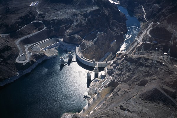 USA, Nevada, Hoover Dam, Aerial view from helicopter showing difference in water levels and overflow channels either side of the dam