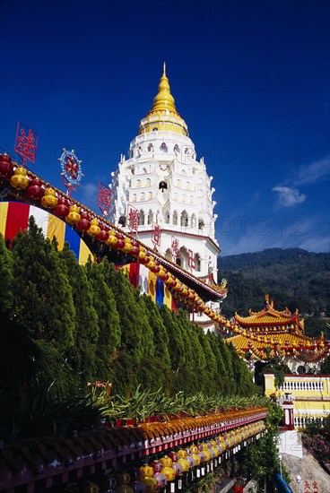 MALAYSIA, Penang, Kek Lok Si Temple, "View along lines of plants and strings of Chinese lanterns towards Ban Po, the Pagoda of a Thousand Buddhas"