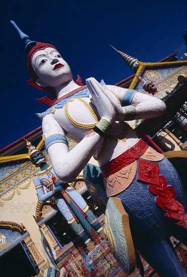 MALAYSIA, Penang, Georgetown, "Wat Chayamangkalaram.  Exterior, temple statues."