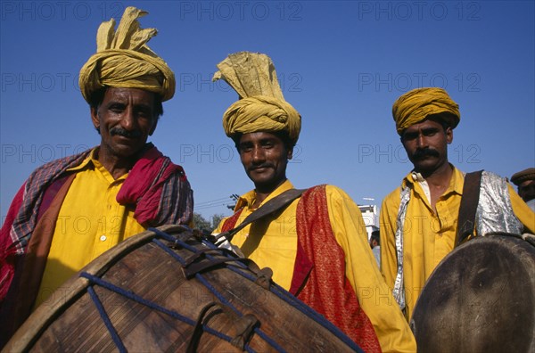PAKISTAN, Punjab, Lahore, Portrait of three drummers
