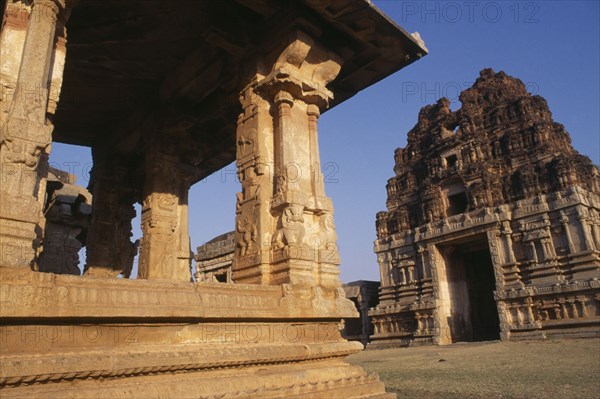 INDIA, Karnataka, Hampi, Ruins of Vijayanagar ancient capital.  Partial view of the exterior of Achyutaraya Temple