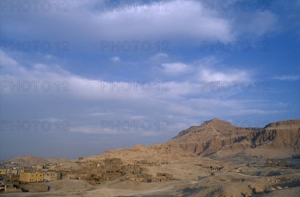 EGYPT, Upper Egypt, Old Qurna, General view of the village with the Tombs Of The Nobles on the hills behind
